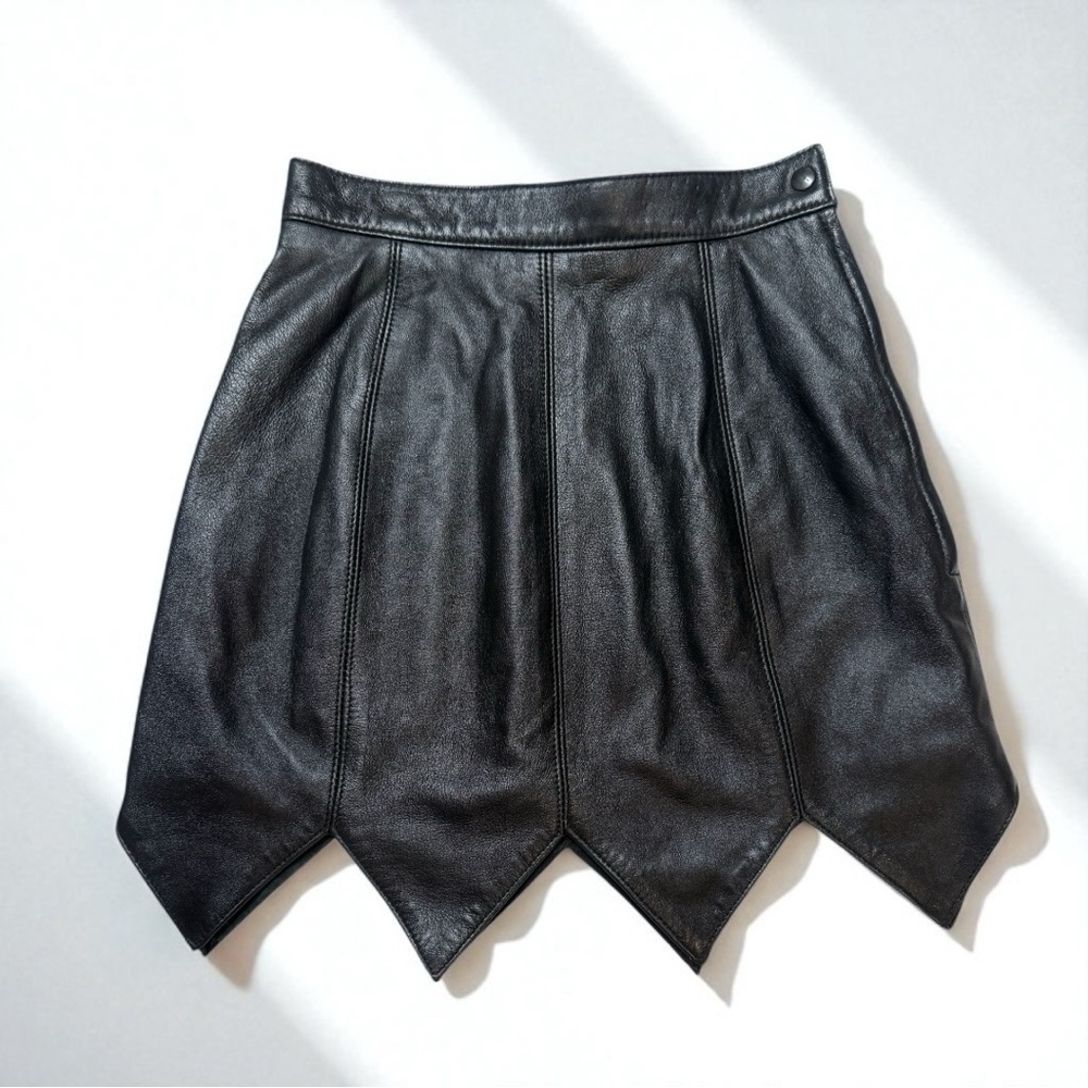 Stylish Vintage 1970’s Black Leather Skirt with Geometric Hem